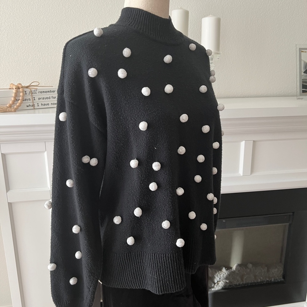 CeCe Black Turtleneck Sweater with White Pom Accents